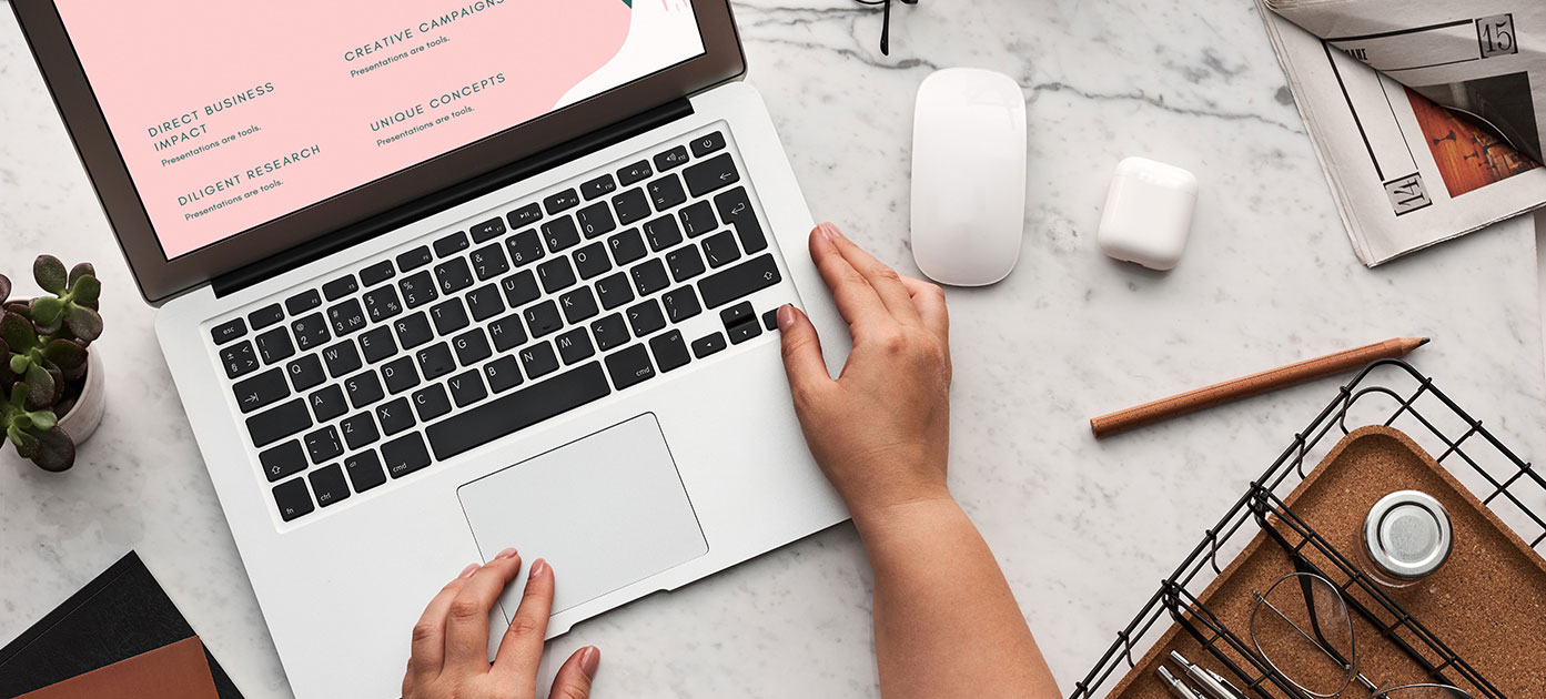 Someone working on computer 20