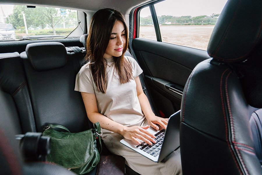 Woman working in a car 21